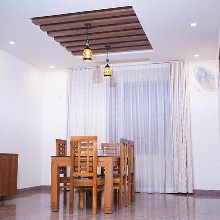 Nandhanam Holidays كانور المظهر الخارجي الصورة